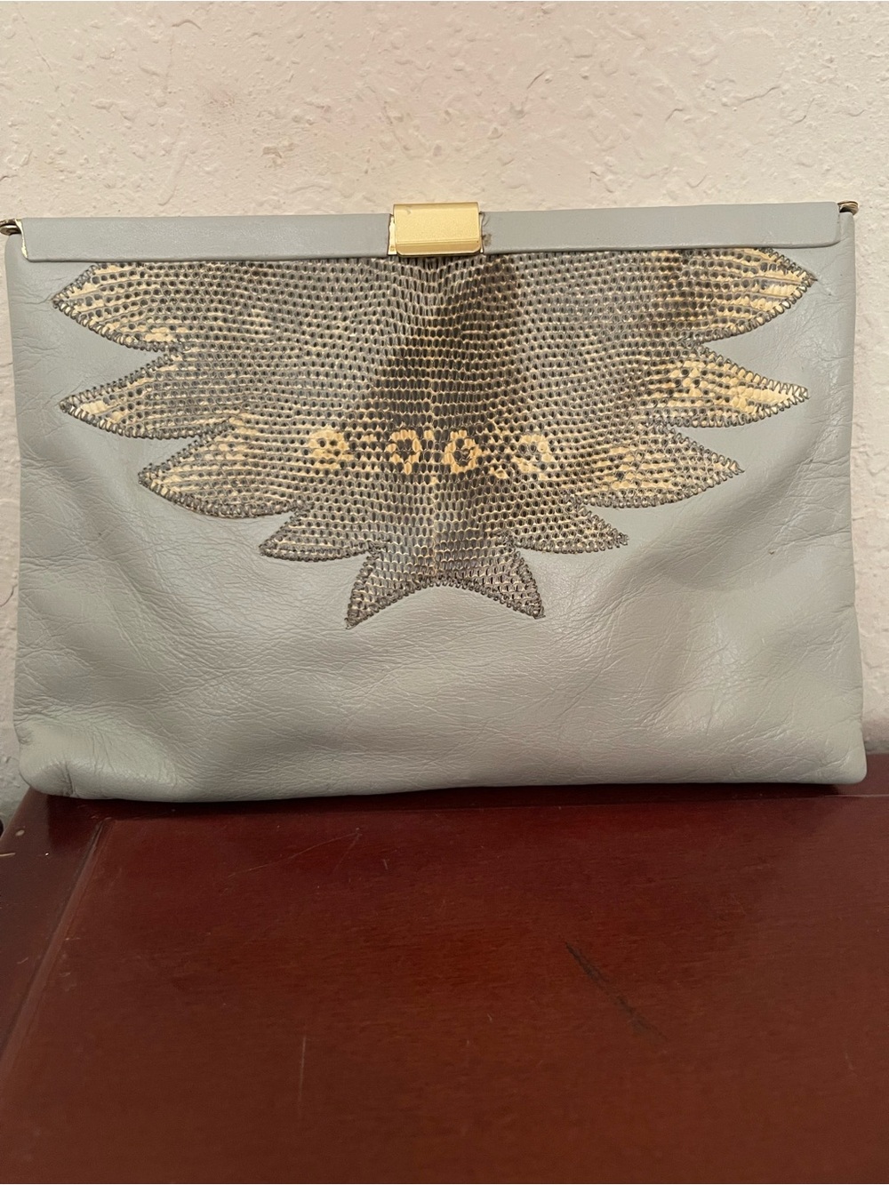 Light Blue Leather Clutch by; Palizzio with Snake-Skin Accent
